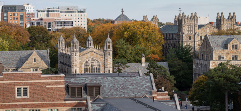 A high angle telephoto view of the rooftops of several Ann Arbor U-M campus builldings