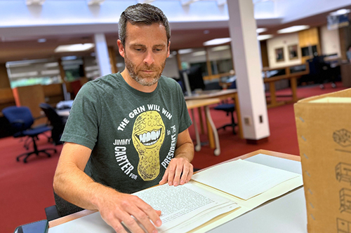Social studies teacher Jeff DeMoss was awarded an annual teaching fellowship by the Bentley and visited the library to research the history of protest movements in Ann Arbor.