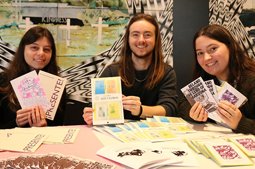 Students at an art exhibit