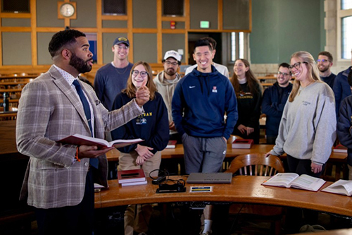 A faculty member leading a classroom discussion