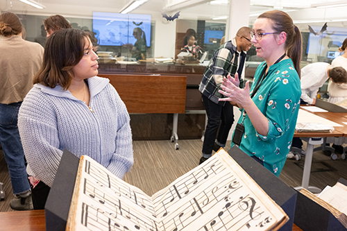 Students and staff participate in a class at the Clements Library.
