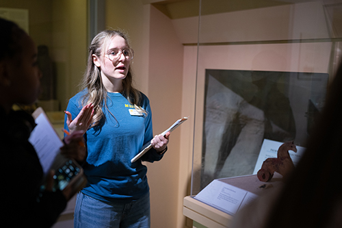 A tour guide at the Kelsey Museum